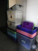 Nineteen assorted plastic storage boxes (fourteen with lids)
