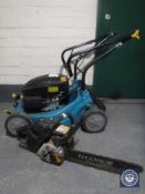 A petrol lawn mower together with a petrol chain saw