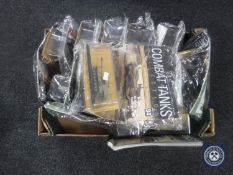 A box containing The Combat Tanks Collection magazines and tanks