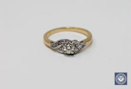 An 18ct gold diamond set ring,