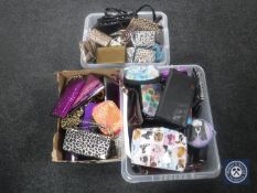 Three boxes containing a large quantity of lady's bags and purses
