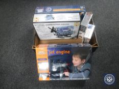 A box containing three boxed engine construction kits together with a Hands-On Science hydraulic