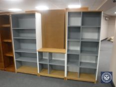 Two sets of cube shelves together with a matching set of open bookshelves