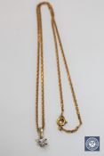 An 18ct gold diamond set pendant on chain, the brilliant-cut stone weighing approximately 0.