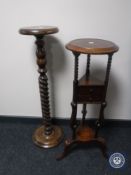 A mahogany wig stand on tripod base together with a pine barley twist torchere