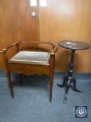 A late Victorian walnut storage piano stool together with an ebonised wine table