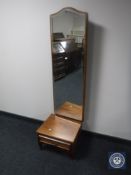 A mahogany cheval mirror fitted a drawer