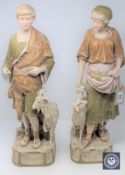 A pair of Royal Dux figures, Shepherd and Shepherdess,