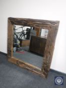 A driftwood framed mirror,
