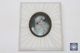 A portrait miniature depicting a lady wearing a head scarf , width 8.9 cm.