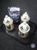 A tray containing a Ringtons Maling chintz water jug together with three Ringtons Fruit Garden