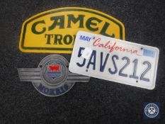 Two cast iron plaques; Camel Trophy and Morris,