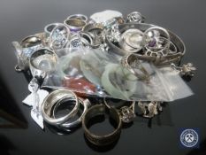 A tub of silver and other jewellery - rings, necklaces,