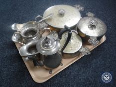 A tray containing 20th century plated wares including a set of three graduated lidded pots,