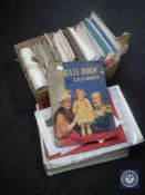 A box containing a quantity of vintage postcards, ephemera, maps,