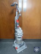A Dyson DC14 upright vacuum cleaner