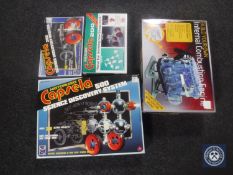 Three boxed Capsela construction sets together with a Haynes build your own combustion engine