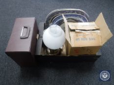 A box of antique meat plates, 20th century health lamp, Maling storm jug,