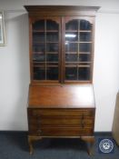 A glazed mahogany bureau bookcase