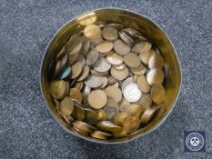 A tin of pre-decimal British pennies