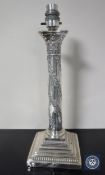 A silver plated Corinthian column lamp base
