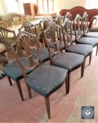 A set of ten mahogany shield back dining chairs