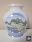 A Royal Copenhagen bulbous vase depicting a manor by a stream,