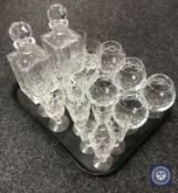 A tray of various cut glass wine glasses, tumblers,