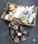 A box containing teddy bear, tea china, cruet set,