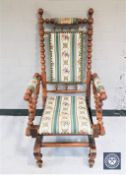 A continental turned beech rocking chair