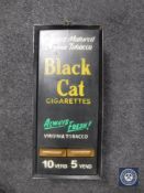 A vending box with Black Cat Cigarette advertising
