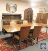 A good quality, probably Lees, heavily carved oak refectory dining table, fully extended 210 cm,