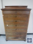 A 19th century continental mahogany seven drawer chest