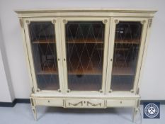 A cream and gilt glazed sideboard/bookcase CONDITION REPORT: 155cm wide by 158cm