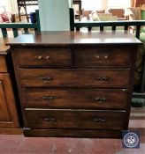 A 19th century oak chest of five drawers