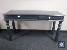 A painted pine side table fitted two drawers