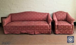An early 20th century continental three seater settee and armchair in classical upholstery