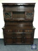 An oak triple door dresser