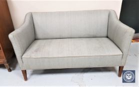 A mid 20th century continental two seater settee in grey upholstery