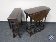 An oak drop leaf table and a mahogany Sutherland table