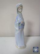 A Lladro figure of a girl in a shawl, 4650,