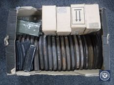 A box containing a large quantity of 20th century rifle magazines,