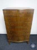 A mahogany serpentine front seven drawer chest