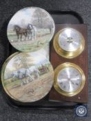 A tray of brass cased barometer and clock mounted on board and six Royal Doulton wall plates