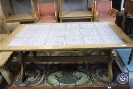 A Danish oak tile topped coffee table