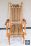 A continental turned oak rocking chair