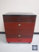 A 20th century five drawer painted chest