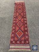 A Meshwani carpet runner 271 cm x 64 cm