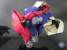 Four Masonic sashes with silver medals,