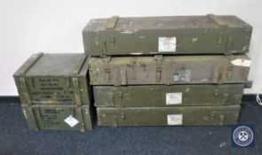 Seven assorted military storage crates
